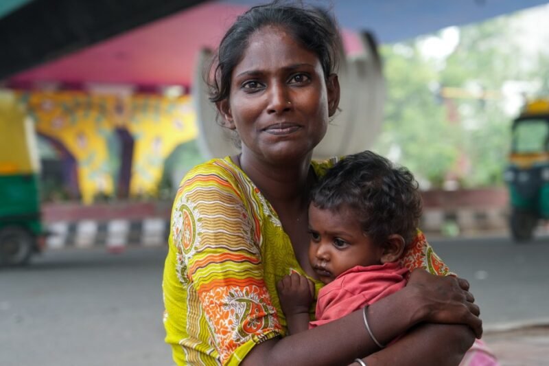 ‘I count their breaths’: A homeless mother protects her children in Delhi | Women