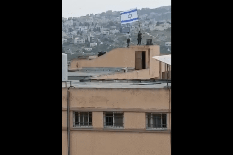 Israeli settlers vandalise school, raise Israeli flag in occupied West Bank | Israel-Palestine conflict