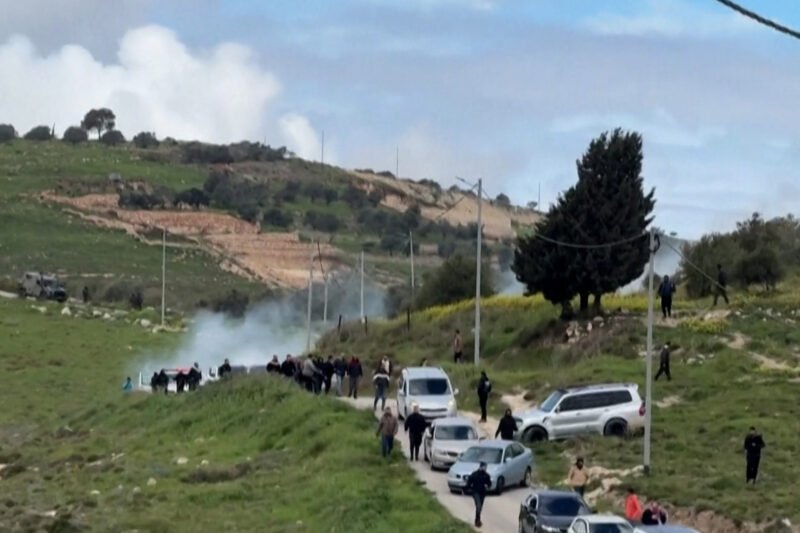 Palestinians flee tear gas as Israeli settlers arrive in occupied West Bank | Occupied West Bank