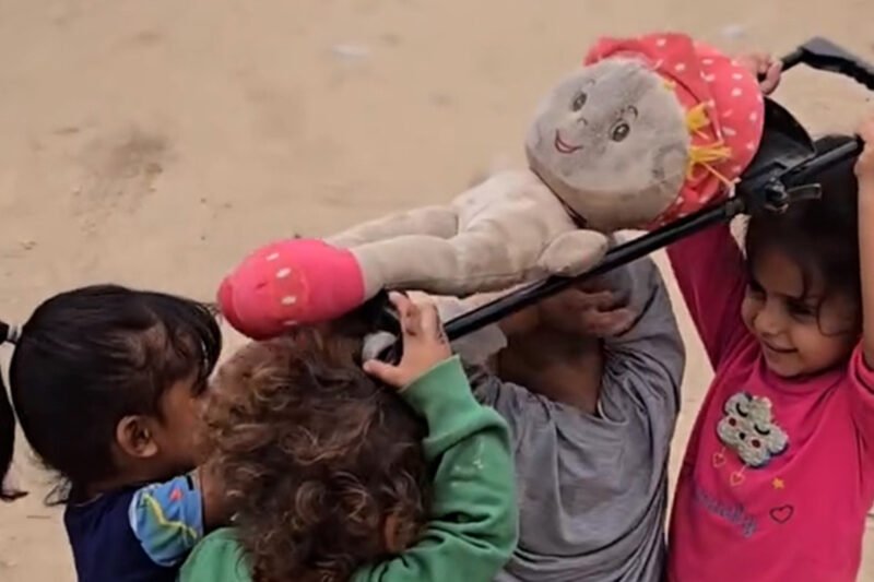 Children in Gaza reenact a funeral procession during play | Gaza